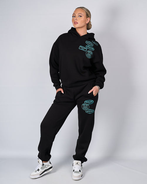 Frauen schwarz Tiffany OG Abzeichen Jogger