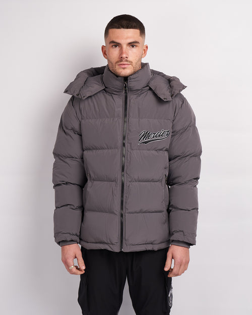 Graue schwarze Teams Puffer Jacke