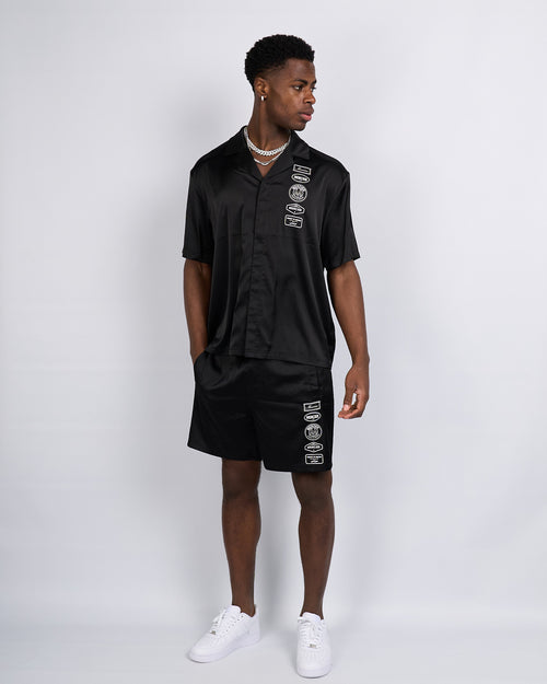 Schwarze 2.0 Badge Resort Shorts